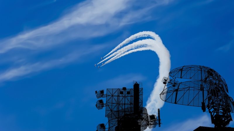 Air defense raiders of military mobile anti-aircraft complexes (radar is designed  and automatic tracking of targets and missiles) against the background of the flight of modern combat fighters,Russia