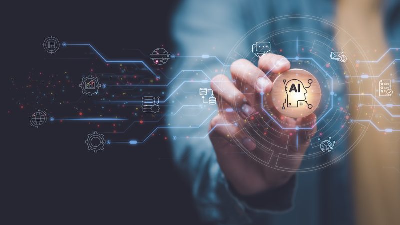 Businessman showing concept, connection,innovation development and artifacts too artificial intelligence ,AI , ideas and innovation ,Finding new solutions to solve business problems ,modern business