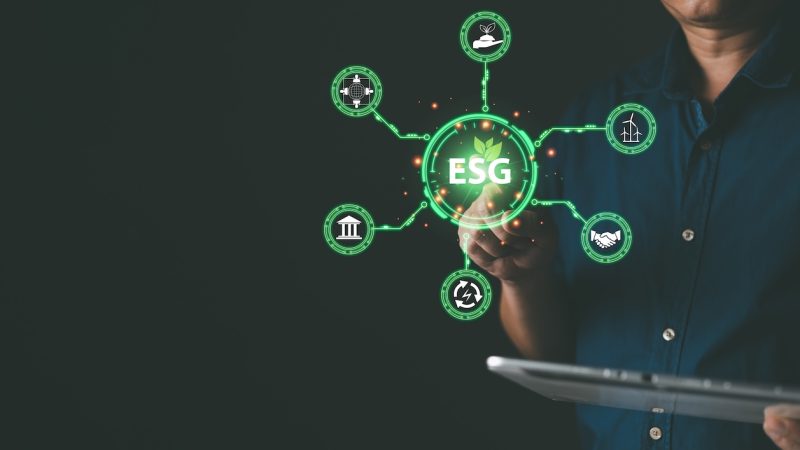 ESG for Environment Social and Governance. hand hold hologram screen to save energy,and reduce global warming,sustainable business investments,carbon credit,eco-friendly investment.