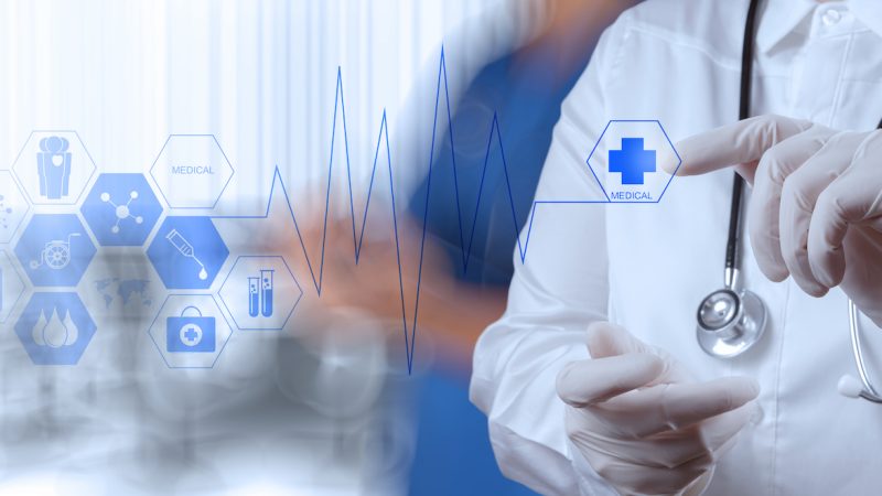 Medicine doctor hand working with modern computer interface as medical concept